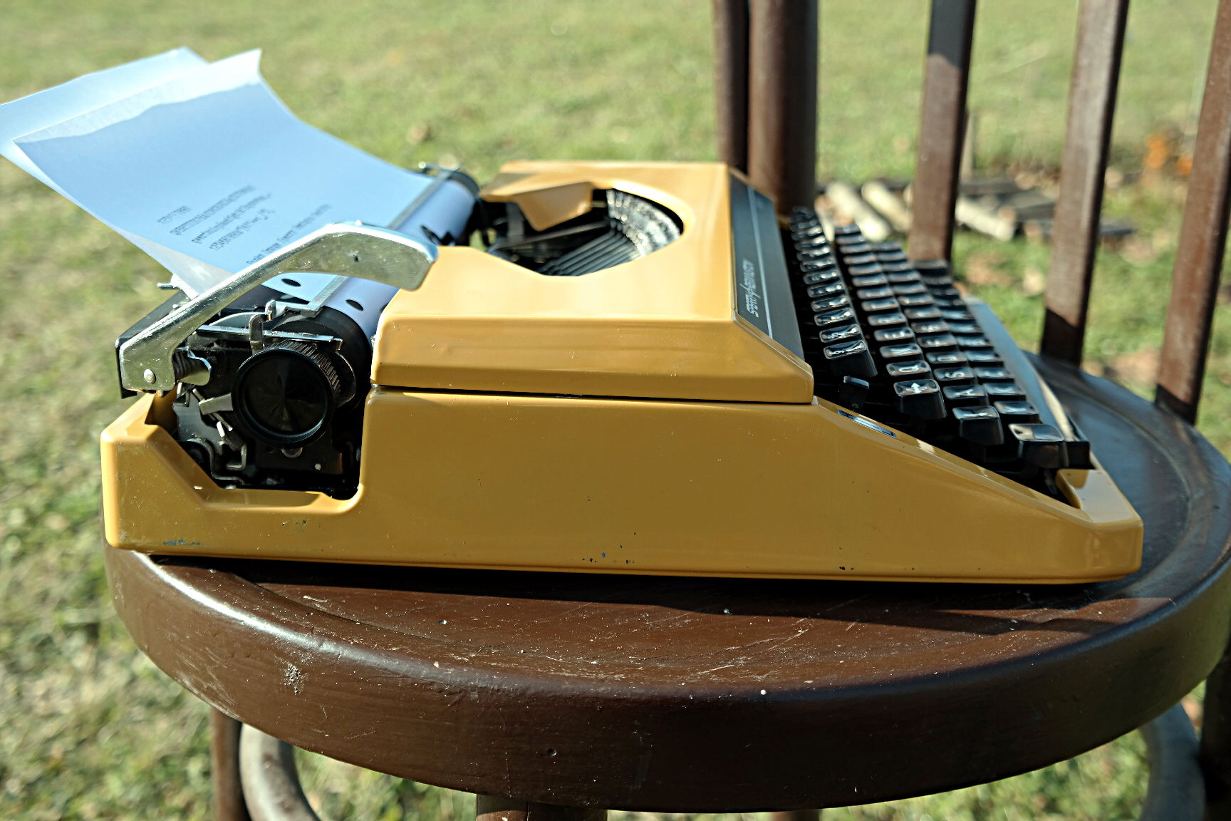 1970s Vintage Sperry Remington TenFifty Portable Typewriter in Mustard Yellow with Original Carry Case.